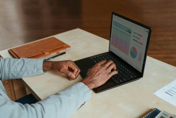 Hybrid work in Ireland – employee working from office with remote collaboration tools
